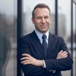 man in suit smiling